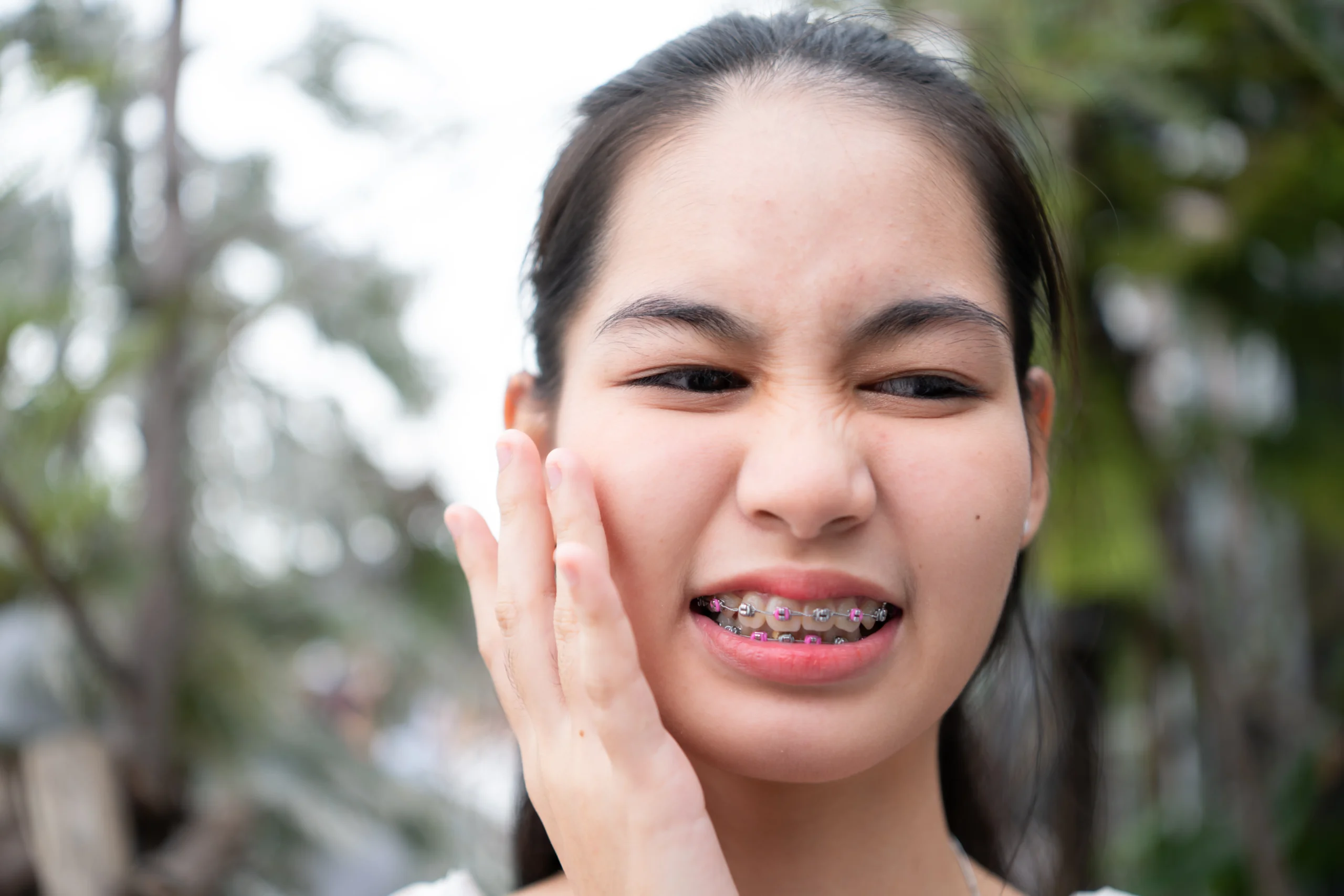 does braces hurt woman wearing braces hurt klinik pergigian prima senawang